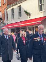 Rotarians taking part in the procession down Godalming High Street